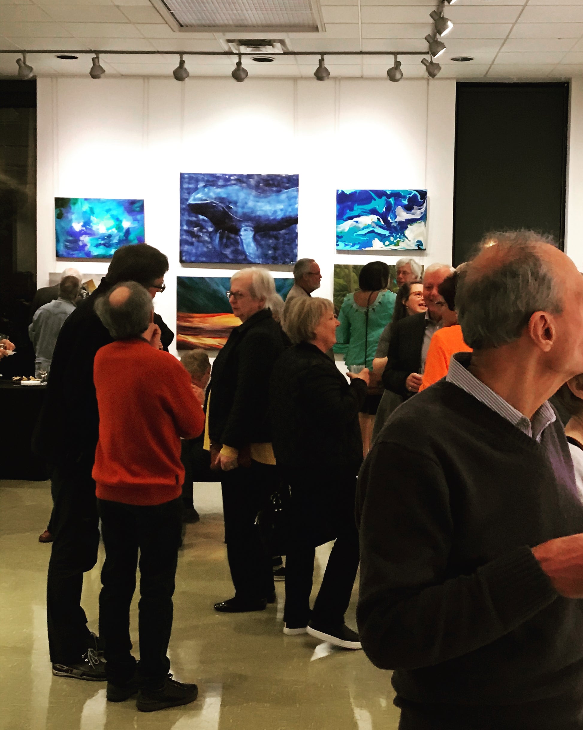 Big Blue - Original Artwork by Reni Fee hanging in a gallery