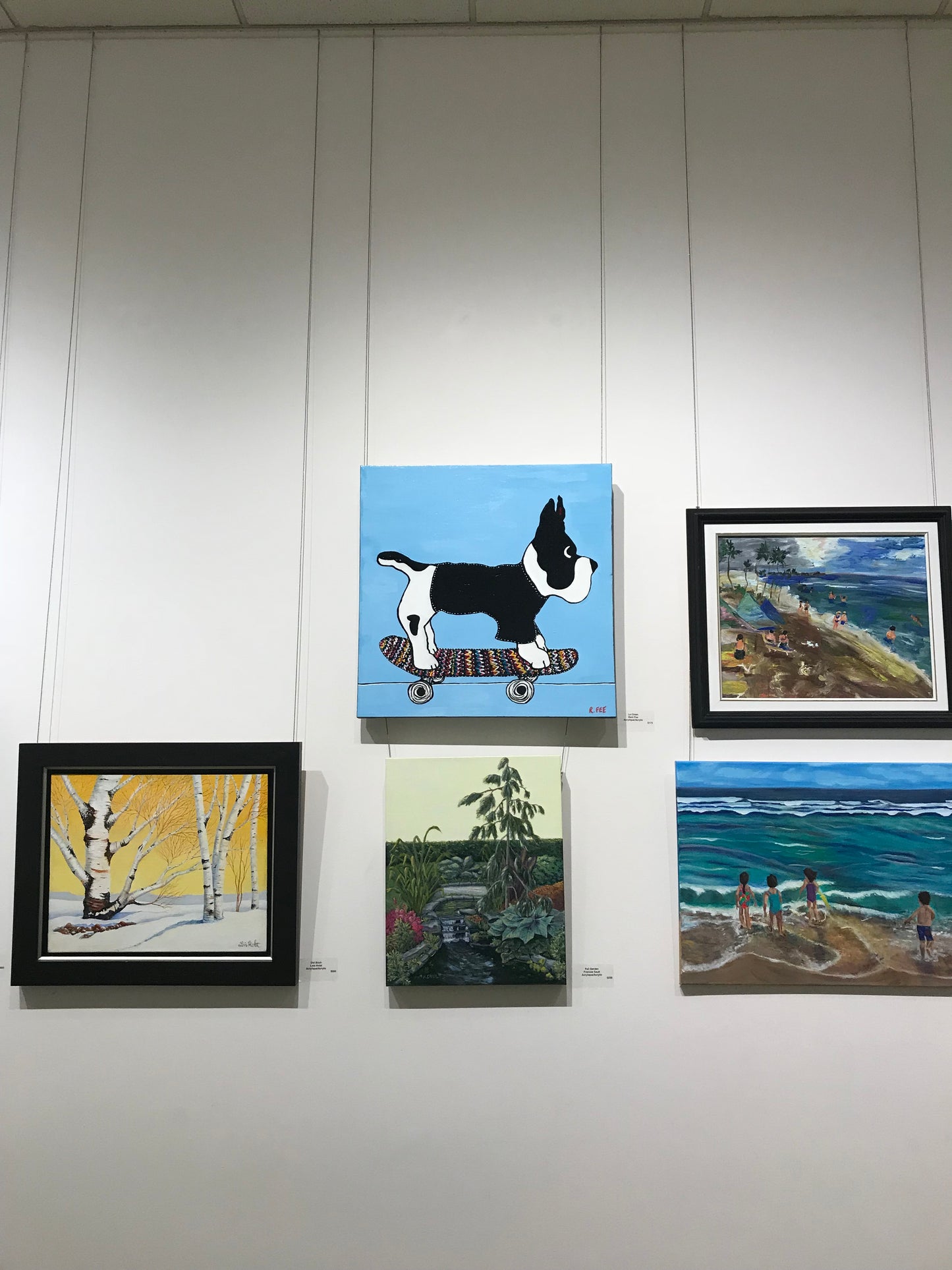 Le Chien - Original Artwork by Reni Fee hanging in a gallery.