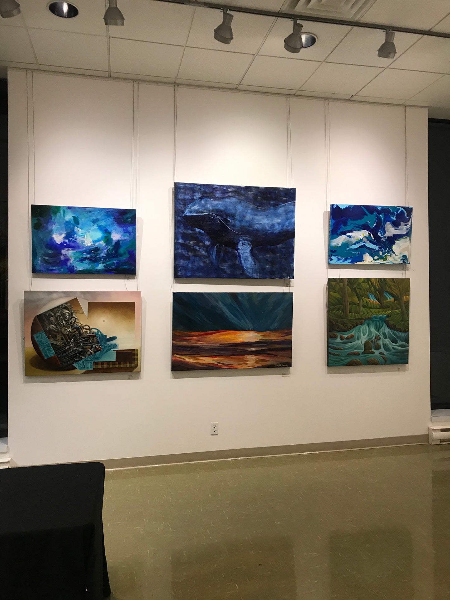 Big Blue - Original Artwork by Reni Fee hanging in a gallery